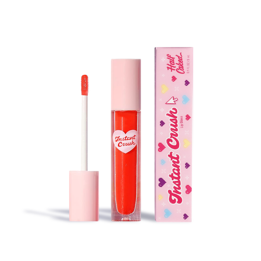 Half Caked Instant Crush Lip Gloss in bright red with pink cap and decorative pink packaging by Innovate the Label