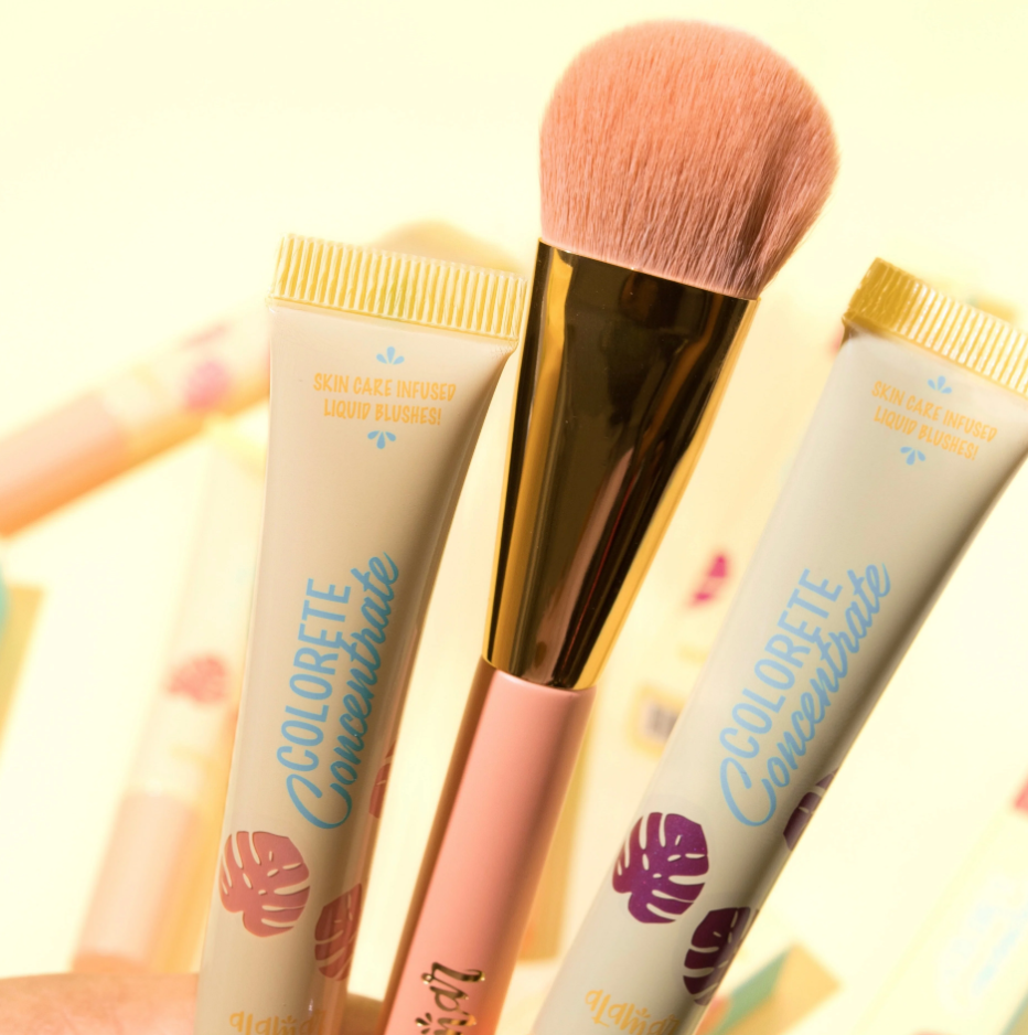Alamar liquid blush brush with soft pink bristles and tubes of skin care infused liquid blush