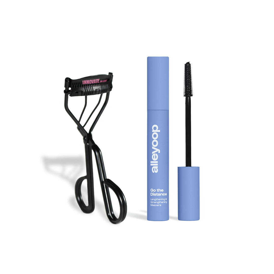 Fast Bundle 2 piece beauty bundle featuring black eyelash curler and blue mascara tube with wand