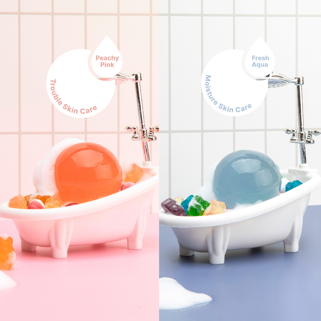 Naisture aqua jelly ball cleanser duo in peachy pink and fresh aqua sitting in mini bathtubs with foam