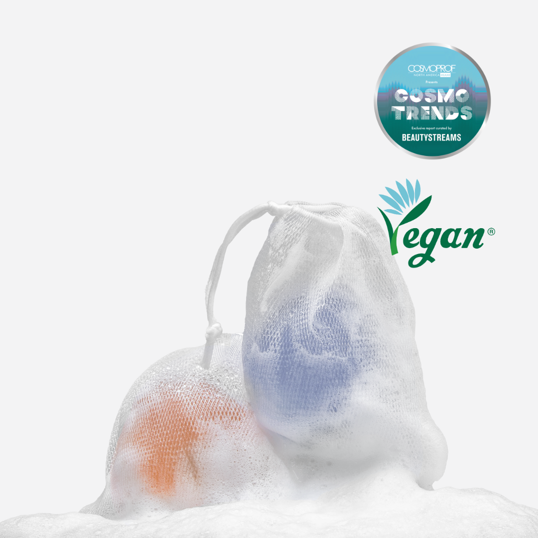 Naisture aqua jelly ball cleanser in white mesh bags with blue and orange jelly balls and foamy lather vegan badge