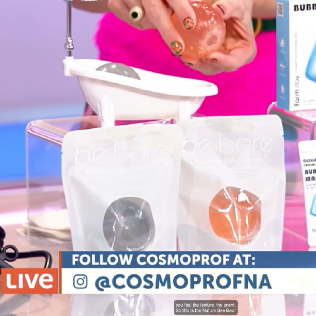 Naisture aqua jelly ball cleanser demo showing orange and gray jelly balls in resealable pouches and a small cleansing bowl