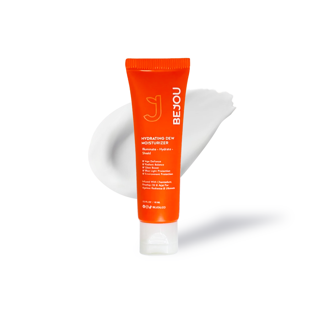 Innovate the Label mini hydrating moisturizer in bright orange tube with white cream smear background