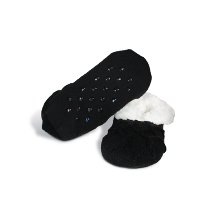 Innovate the Label black cozy booties for women with soft white fleece lining and non-slip soles