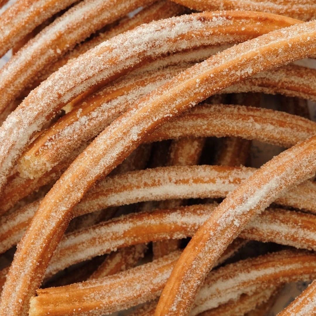 Close-up of sugar-coated churros resembling texture for vegan lip scrub exfoliation
