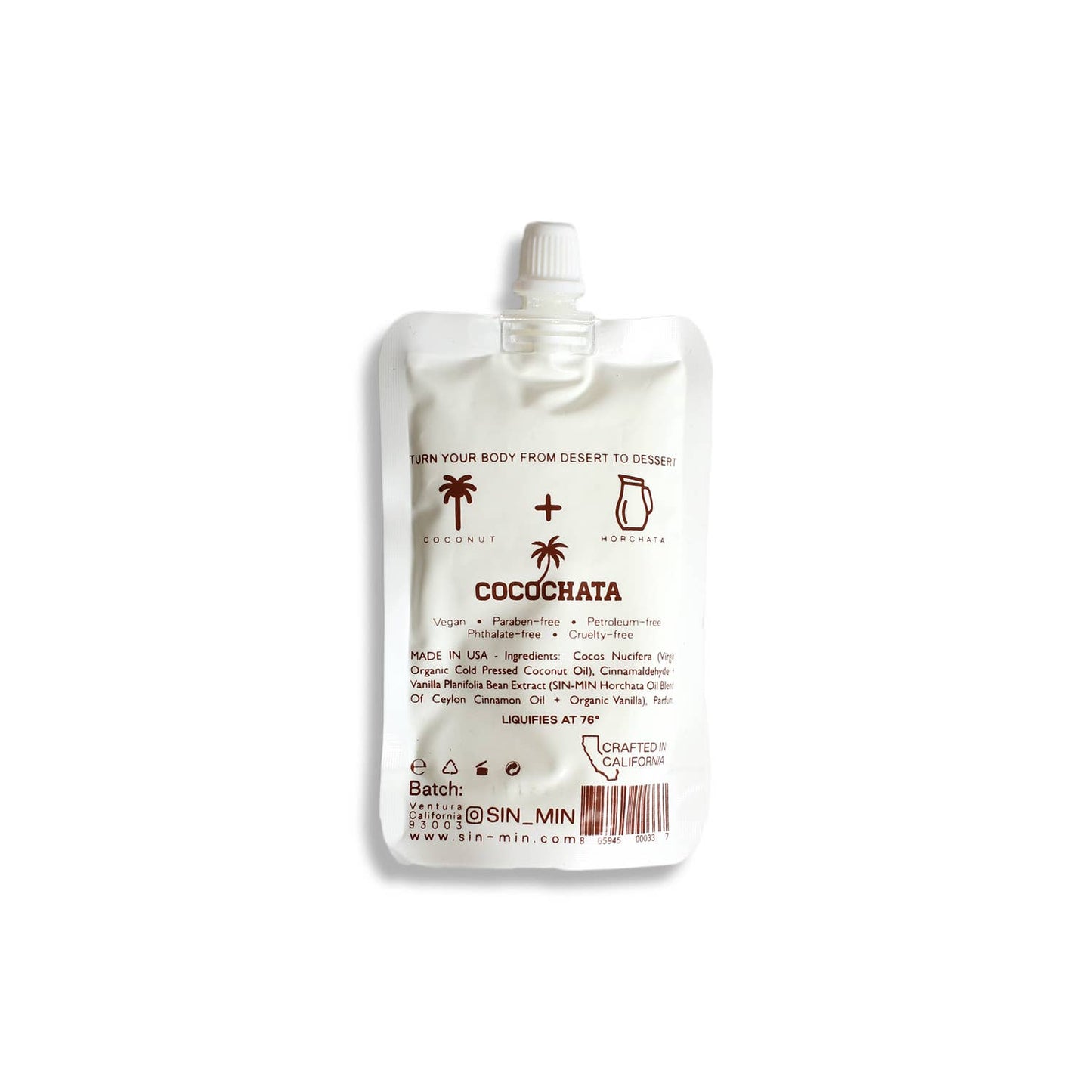 SIN-MIN coconut oil cinnamon body lotion in a white squeeze pouch with twist cap