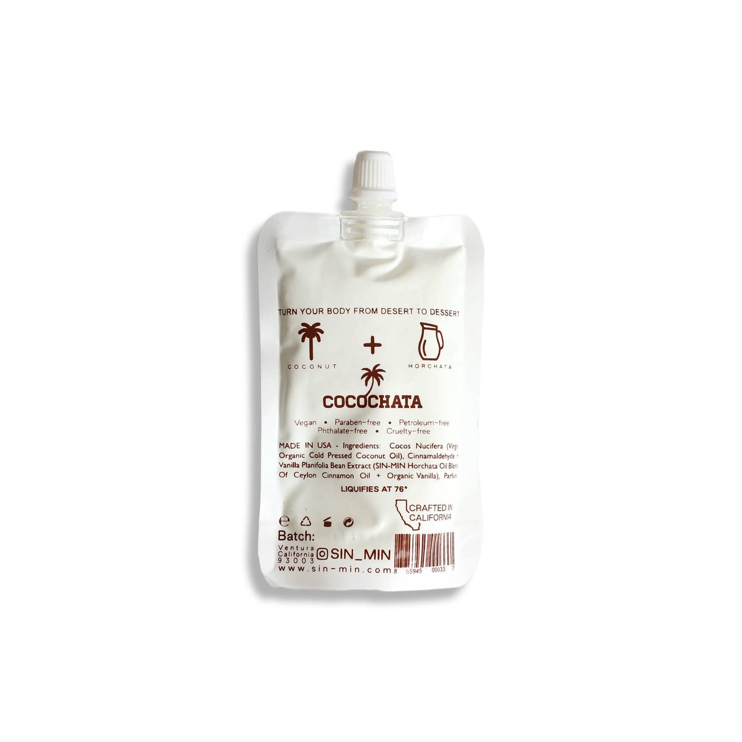 SIN-MIN coconut oil cinnamon body lotion in a white squeeze pouch with twist cap