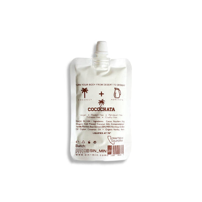 SIN-MIN coconut oil cinnamon body lotion in a white squeeze pouch with twist cap