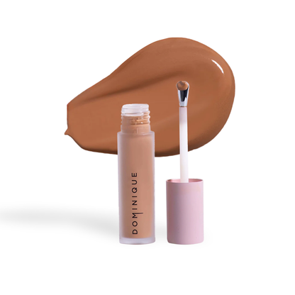 Innovate the Label Dominique Cosmetics concealer with applicator and brown concealer swatch