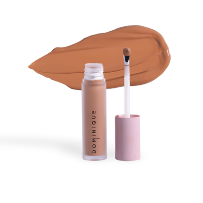 Dominique Cosmetics concealer by Innovate the Label with applicator wand and medium beige shade swatch