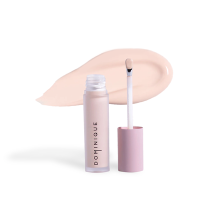 Dominique Cosmetics concealer by Innovate the Label with light beige shade and applicator wand