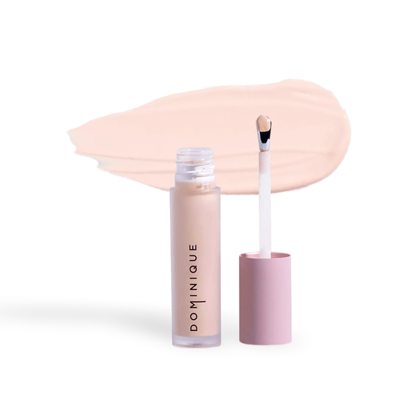 Dominique Cosmetics concealer by Innovate the Label with applicator and light beige shade smear