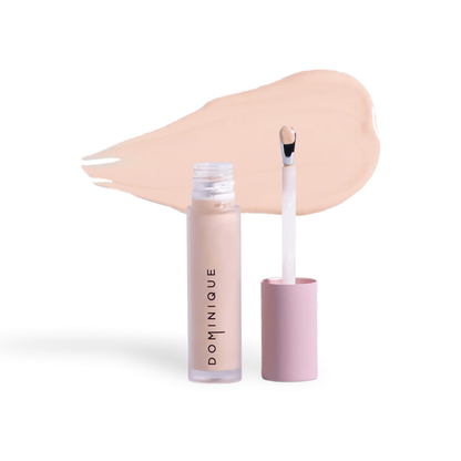 Innovate the Label Dominique Cosmetics concealer with applicator wand and light beige shade swatch
