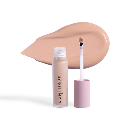 Innovate the Label Dominique Cosmetics concealer with applicator and creamy beige shade smear