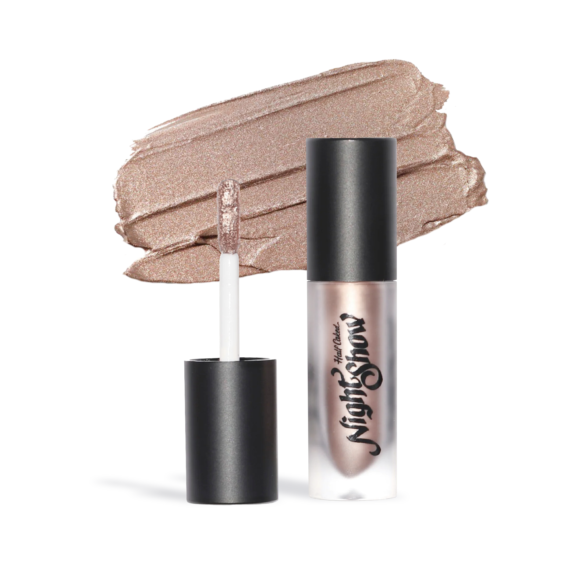 Half Caked Night Show Liquid Shadow in shimmering nude shade with applicator and smeared swatch