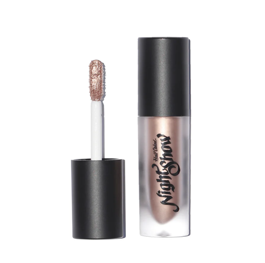Half Caked Night Show Liquid Shadow in a metallic rose gold shade with applicator wand