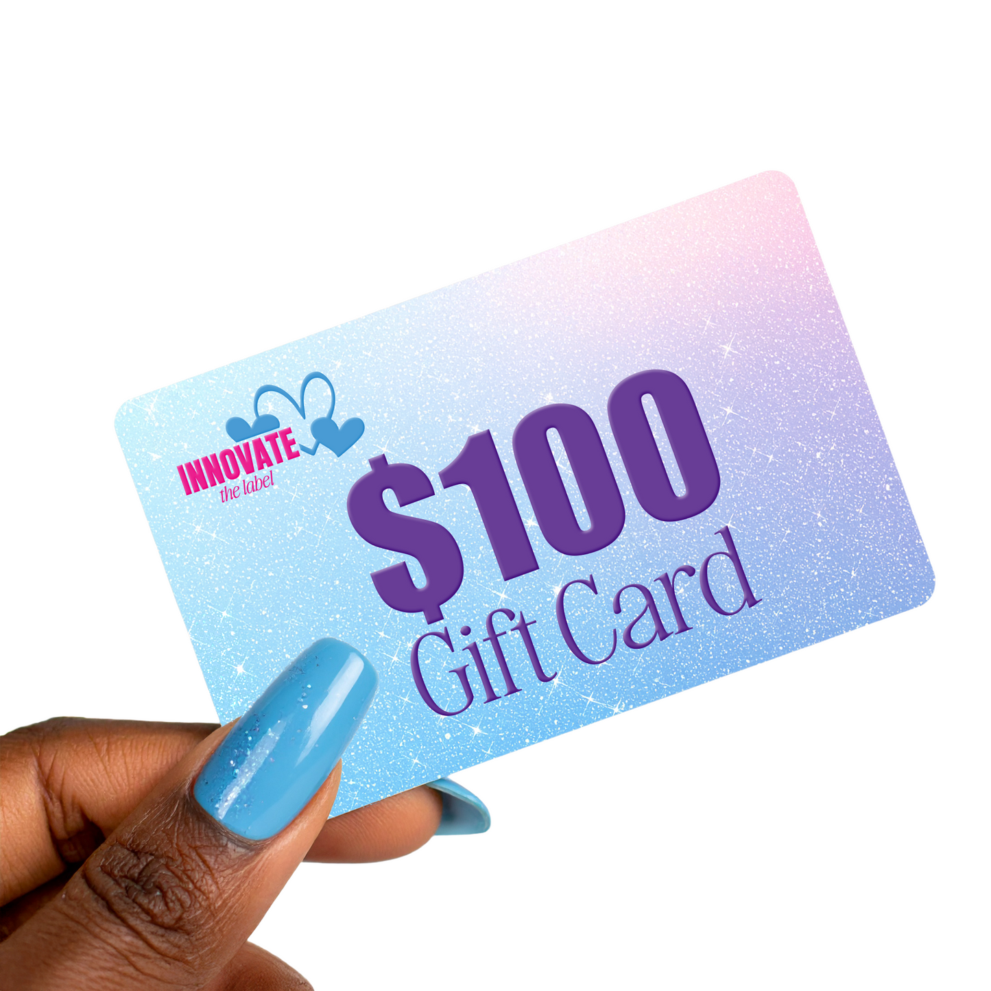 Hand with blue manicure holding Innovate the Label 100 dollar gift card on glitter gradient background beauty gift card online