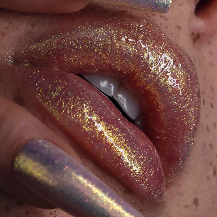 Brillo de labios multidimensional de alto brillo Queen Cosmetics en Interstellar