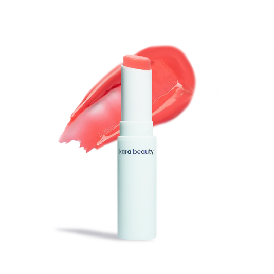 Kara Beauty strawberry gloss stick coral pink balm in white tube with glossy swatch and sheer moisturizing shine