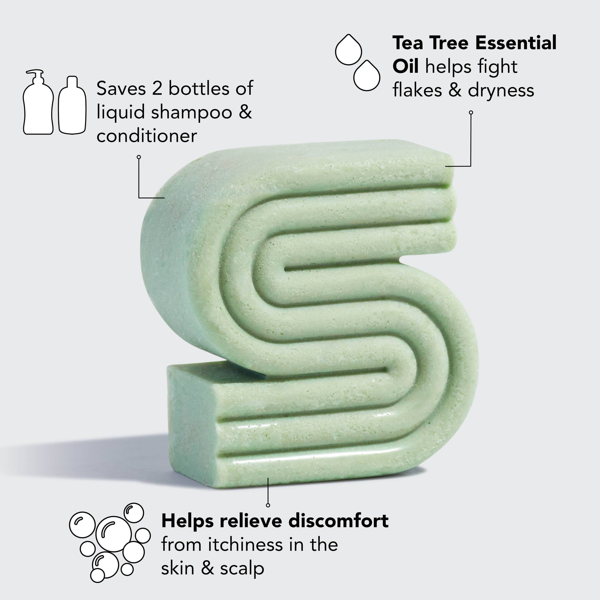 Innovate the Label green anti dandruff shampoo bar shaped in a unique S design with tea tree essential oil benefits
