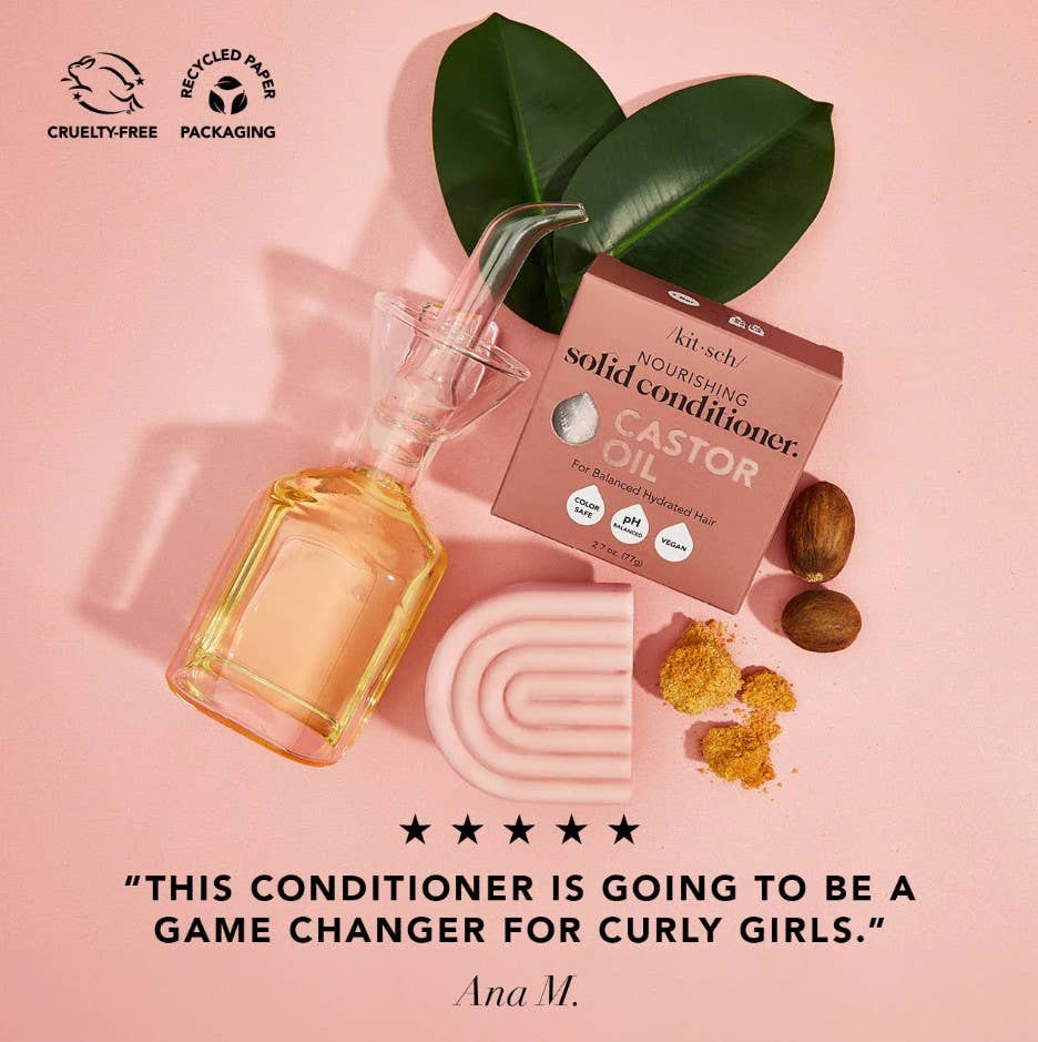Innovate the Label castor oil conditioner bar with pink curved bar, packaging, and natural ingredients on pink background