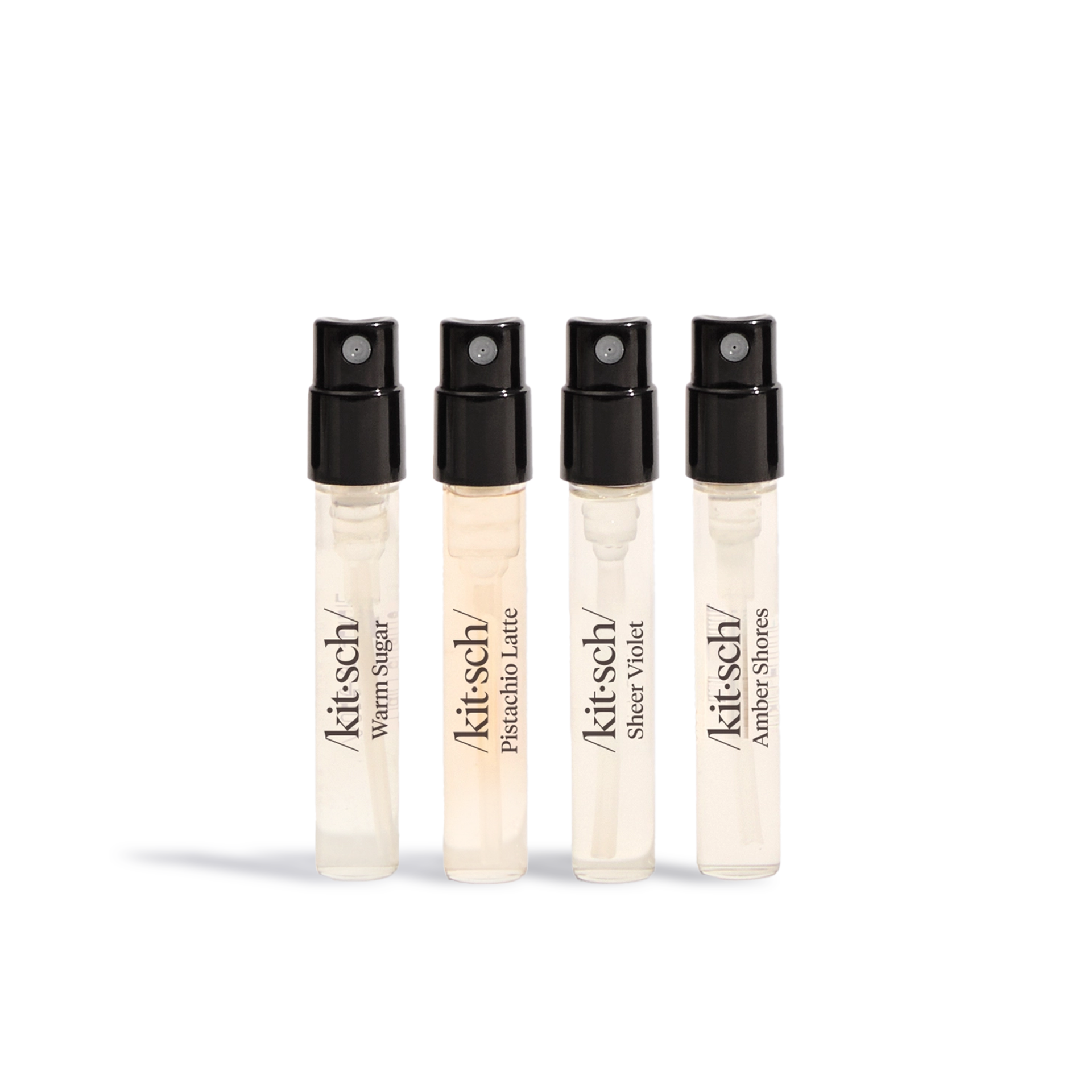 Kitsch hair perfume set by Innovate the Label with four different fragrance sprays in small clear bottles