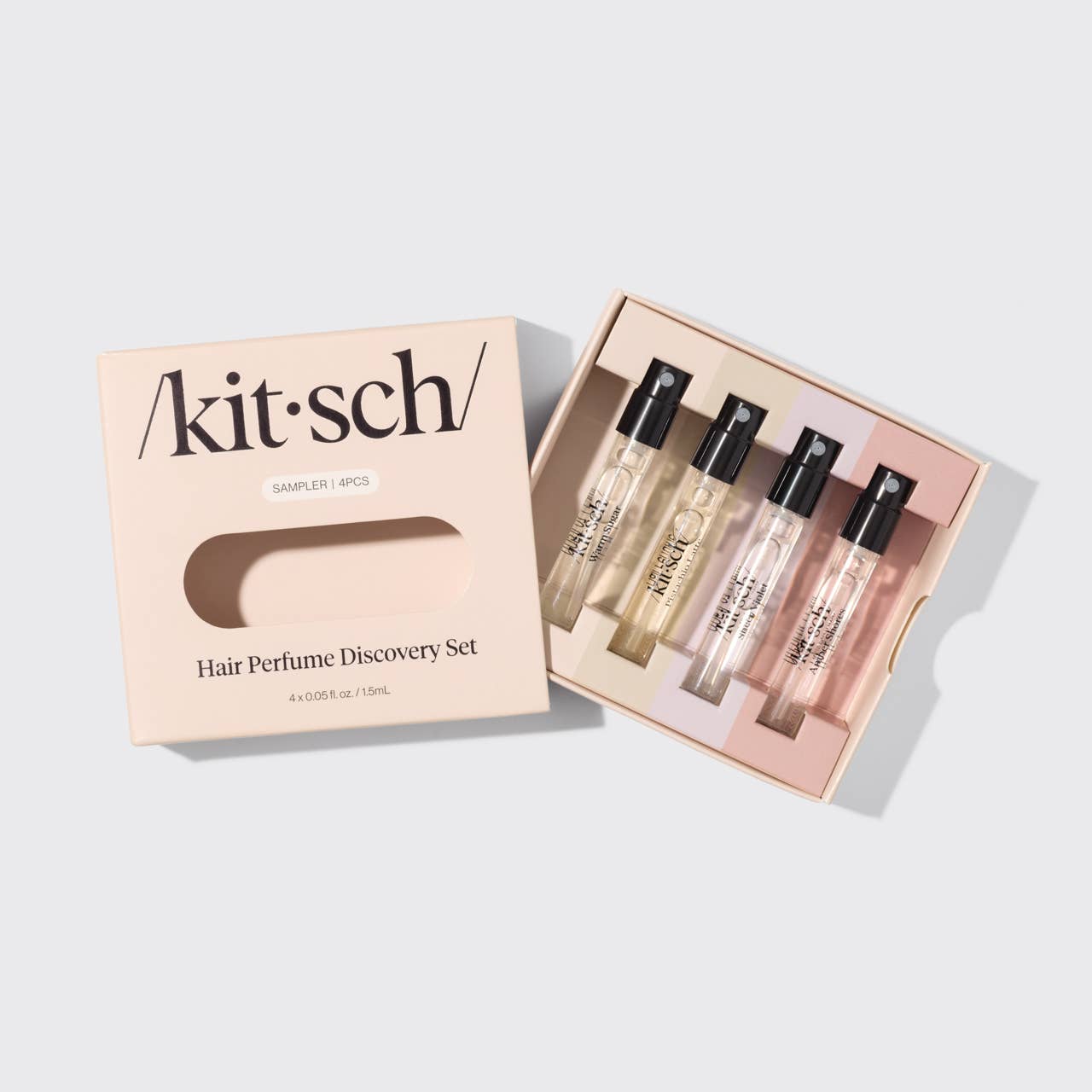 Kitsch hair perfume set by Innovate the Label with four sample-sized bottles in a discovery box