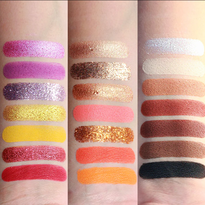 Swatches of vibrant and neutral shades from the Leyva Beauty eyeshadow palette by Innovate the Label