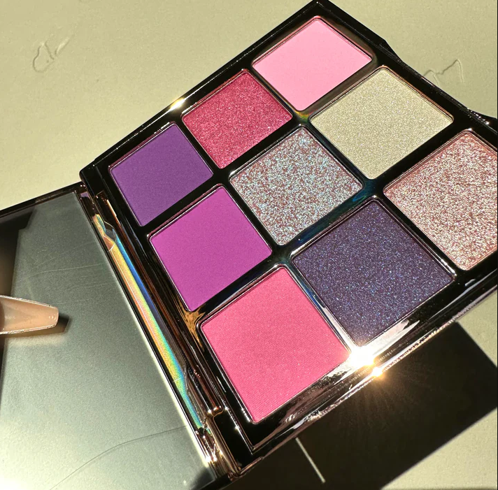 Innovate the Label Leyva Beauty eyeshadow palette with nine vibrant and shimmery shades in pink and purple tones