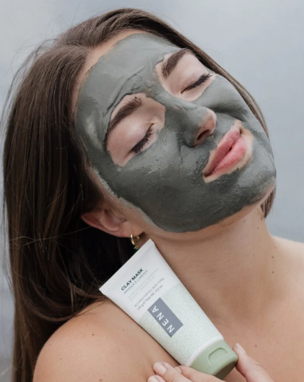 Innovate the Label everyday beauty essentials bundle featuring a woman with a clay mask and a skincare product