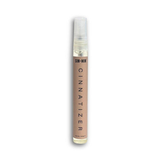 SIN-MIN cinnamon vanilla hand sanitizer spray in a slim transparent bottle with beige label