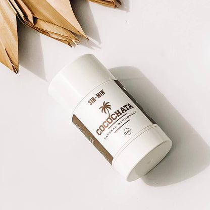 SIN-MIN Cocochata natural deodorant travel size stick with brown and white label on white background