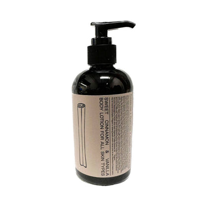 SIN-MIN sweet cinnamon vanilla body lotion in black pump bottle with beige label